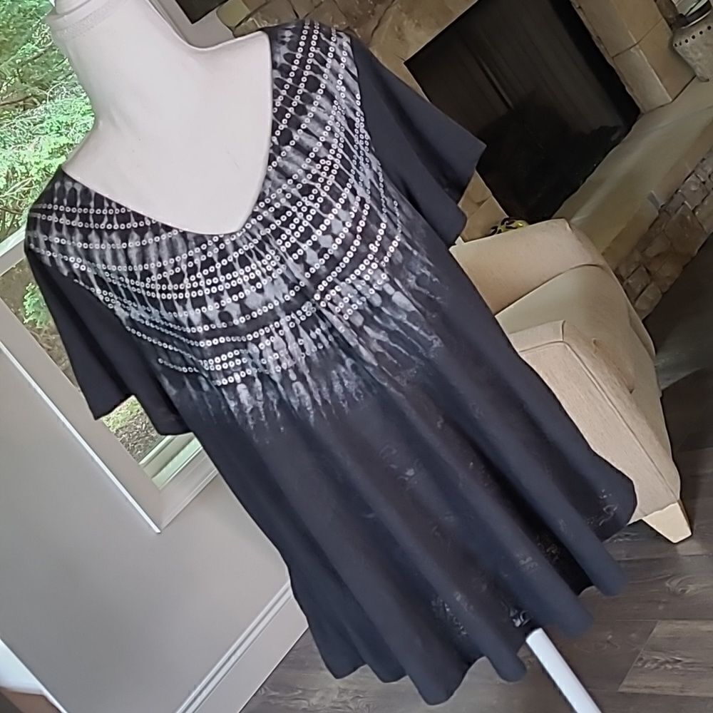 Black top with front faux sequins with crocheted back panel